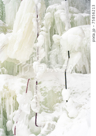 Frozen waterfall from a stone cliff in the national park. Frozen waterfall from a stone cliff in the national park. 75856213