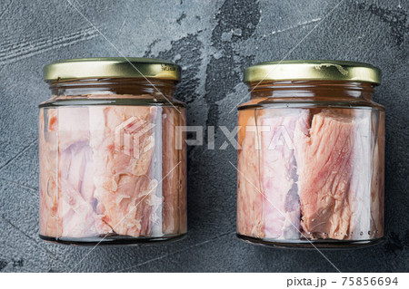 Tuna fillet canned, on gray background, top view 75856694