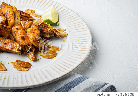 Grilled Mango Prawns or shrimps, on plate, on white background , with copyspace and space for text Grilled Mango Prawns or shrimps, on plate, on white background , with copyspace and space for text 75856909
