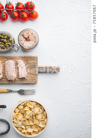 Semolina tuna pasta ingredients, on white background, top view with copy space for text Semolina tuna pasta ingredients, on white background, top view with copy space for text 75857067