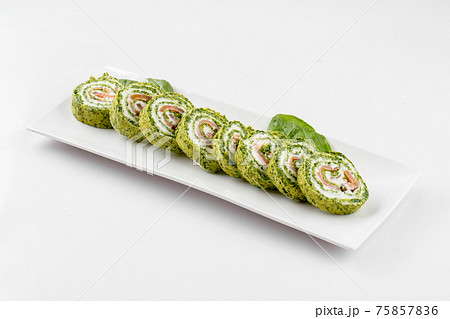 Isolated sliced green salmon appetizer rollplatter 75857836