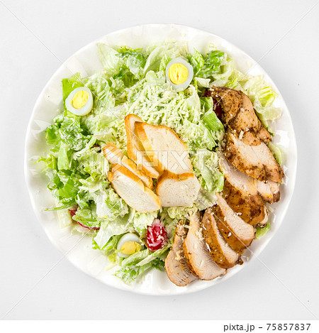 Russian style caesar chicken salad on white 75857837
