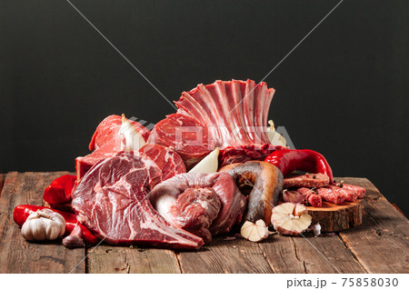 Assorted variety of different raw beef meat parts 75858030