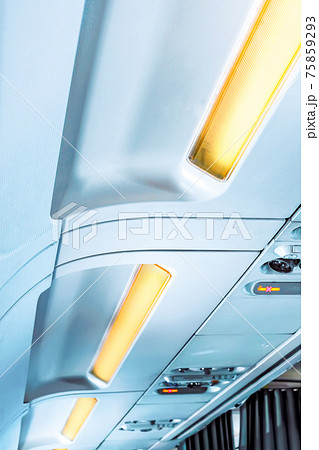 Fragment of   interior view of modern Airplane. 75859293