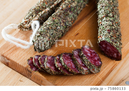 Catalan sausage fuet in herbs Catalan sausage fuet in herbs 75860133