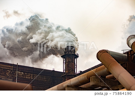 atmospheric air pollution by mining and metallurgical enterprises. thick smoke from the factory chimneys. atmospheric air pollution by mining and metallurgical enterprises. thick smoke from the factory chimneys. 75864190