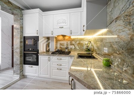 Modern classic white kitchen interior with wooden furniture Modern classic white kitchen interior with wooden furniture 75866000