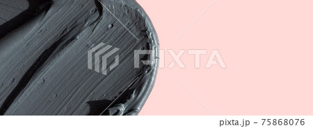 Closeup black facial mask smudge 75868076
