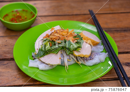 Traditional Vietnamese dish - Banh Cuon, steamed rice noodle rolls 75876047