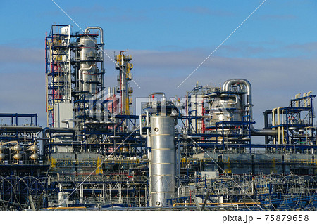 Corps of Moscow refinery in spring in clear weather Corps of Moscow refinery in spring in clear weather 75879658