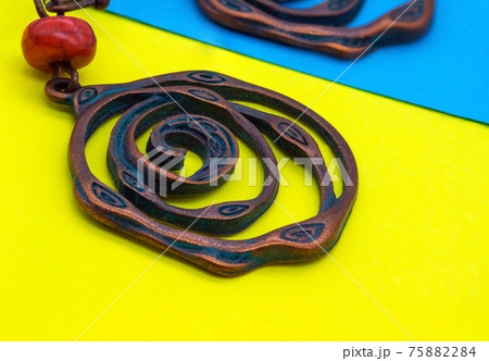 Ethnic decorations on colored sheets of paper. Ethnic decorations on colored sheets of paper. 75882284