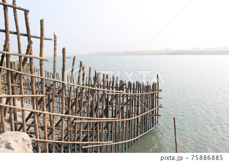 bamboo fence and wall for safety of beach sand 75886885