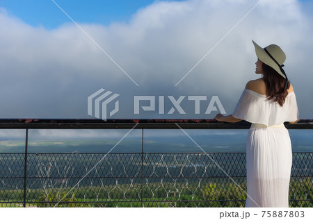 Woman at viewpoint. Woman at viewpoint. 75887803