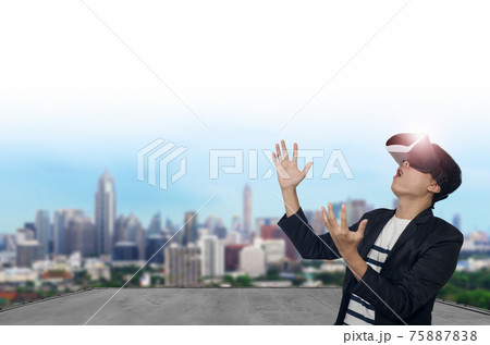 Man with virtual reality goggles. Man with virtual reality goggles. 75887838
