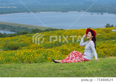 Beautiful woman in nature flower. Beautiful woman in nature flower. 75888624
