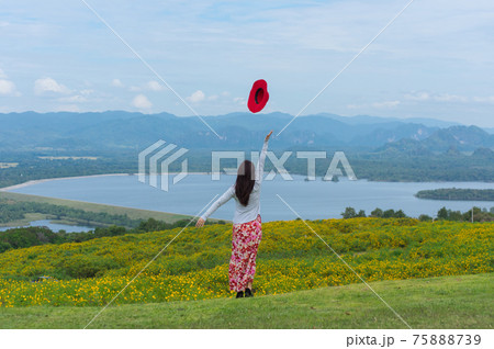 Beautiful woman in nature flower. Beautiful woman in nature flower. 75888739