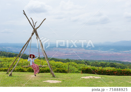women happy playing swing. women happy playing swing. 75888925