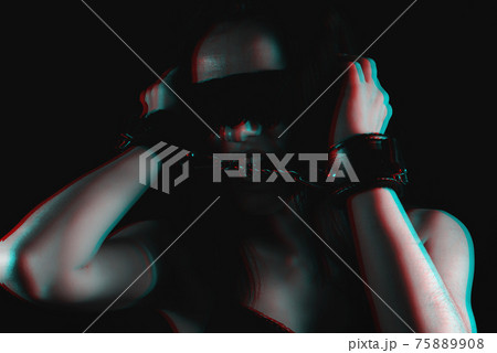 portrait of a passionate submissive girl in leather handcuffs and a blindfold portrait of a passionate submissive girl in leather handcuffs and a blindfold 75889908
