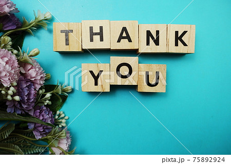 Thank You alphabet letters with space copy on blue background Thank You alphabet letters with space copy on blue background 75892924