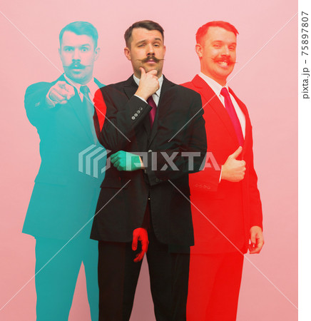 Young business man in black suit on pink background with glitch effect. 75897807