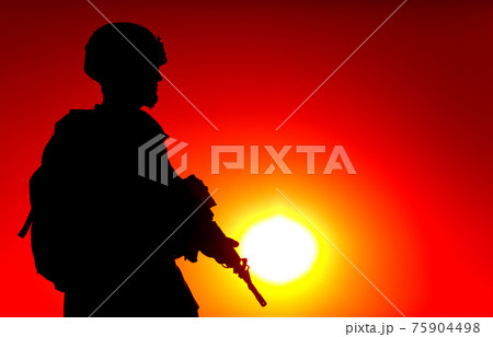 Anti-terrorist forces soldier patrolling beach 75904498