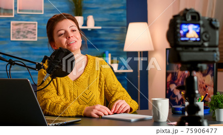 Blogger influencer recording video blog concept speaking at camera 75906477