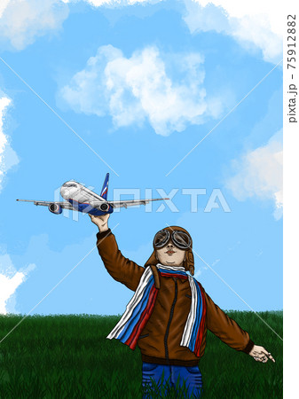 Young aviator. The boy launches his first plane into the sky. Young aviator. The boy launches his first plane into the sky. 75912882