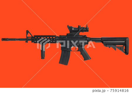 Assault rifle with optic sight and a foregrip on red background 75914816