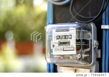 Electricity meters for home electrical appliances, including blurred natural green backgrounds, electric power usage concepts, and electricity usage audits. Electricity meters for home electrical appliances, including blurred natural green backgrounds, electric power usage concepts, and electricity usage audits. 75916447