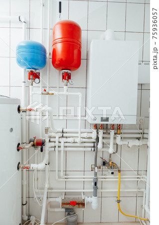 modern independent heating system in boiler room modern independent heating system in boiler room 75936057