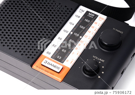 Vintage radio for listening to radio programs on a white background Vintage radio for listening to radio programs on a white background 75936172