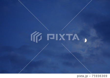 Moon in the evening sky Moon in the evening sky 75936369