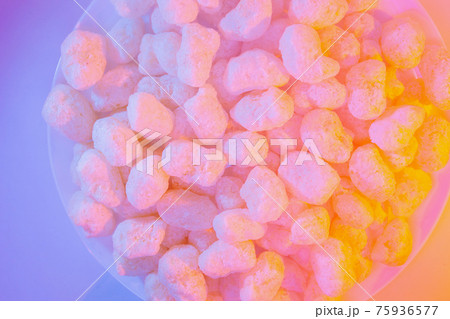 Corn sticks in sugar powder. Sweet food background 75936577