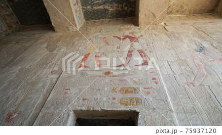 Hieroglyphics with remained color painting over craved stone wall at Mortuary Temple of Hatshepsut, Valley of the kings Egypt Hieroglyphics with remained color painting over craved stone wall at Mortuary Temple of Hatshepsut, Valley of the kings Egypt 75937120