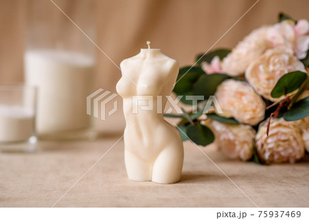 Beautiful candle in the shape of a human body Beautiful candle in the shape of a human body 75937469