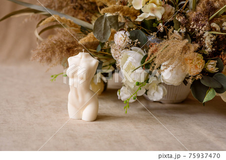 Beautiful candle in the shape of a human body Beautiful candle in the shape of a human body 75937470