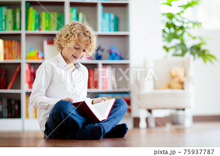 Child reading book. Kids read. School education. Child reading book. Kids read. School education. 75937787