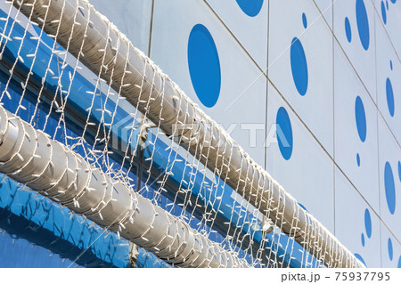 Industrial metal pipeline and modern city building Industrial metal pipeline and modern city building 75937795