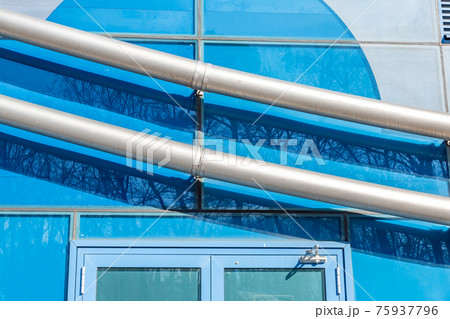 Industrial metal pipeline and modern city building 75937796