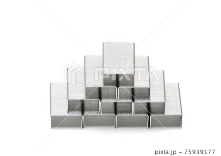 Paper clips from a stapler on a white background 75939177