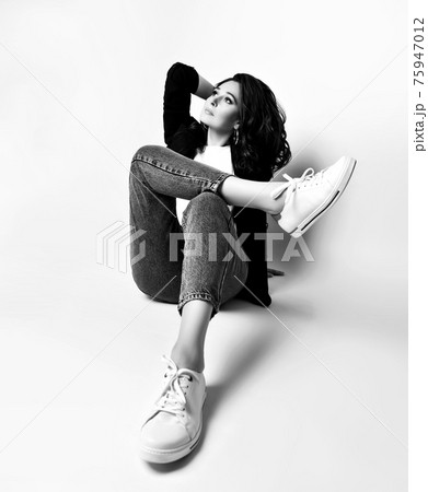 Black and white portrait of calm adult woman in Black and white portrait of calm adult woman in 75947012