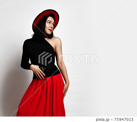 Flirty mature woman in black sleeveless top, red Flirty mature woman in black sleeveless top, red 75947015