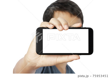 Young man showing smartphone isolated on white background. 75953451