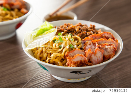Kolo Mee is a Sarawak Malaysian dish of dry noodles tossed in a savoury pork and shallot mixture, topped off with fragrant fried onions. Kolo Mee is a Sarawak Malaysian dish of dry noodles tossed in a savoury pork and shallot mixture, topped off with fragrant fried onions. 75956135