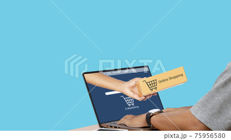 Online Shopping Website on Laptop isolated on blue background. clipping path. 75956580