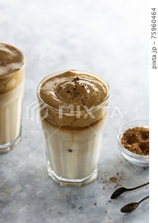 Iced dalgona coffee, frothy creamy whipped coffee cold drink 75960464