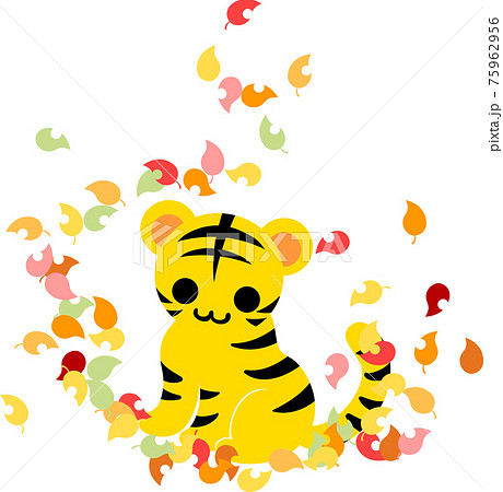 秋の落ち葉の中に佇む可愛い虎ちゃんのイラストのイラスト素材