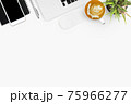 White office desk table with laptop, smartphone, cup of coffee and supplies. Top view with copy space, flat lay. 75966277
