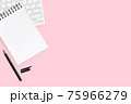 Pink pastel office desk with blank notebook, pen and computer keyboard. Top view with copy space, flat lay. 75966279