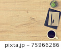 Wood hipster desk with notebook, pen and coffee. Top view with copy space, flat lay. Vintage tone. 75966286